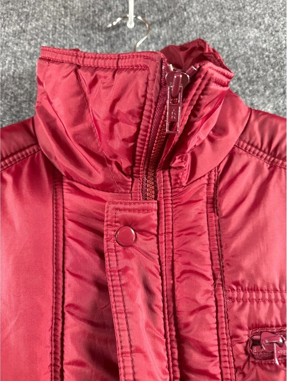 Red Quilted Puffer Jacket with Multiple Pockets and Zip Closure